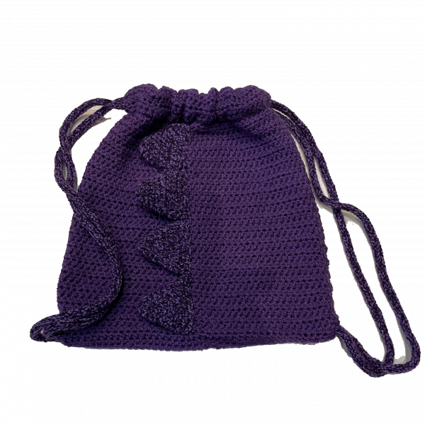 Handmade crocheted dinosaur bag. Made to an original design by Lisa.