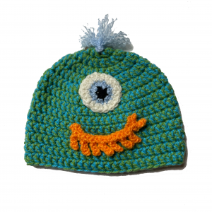Handmade crocheted monster hat for 6 - 12 months. Made to an original design by Lisa.