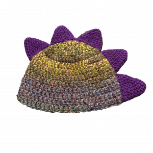 Handmade crocheted dinosaur hat for 6 - 12 months. Made to an original design by Lisa.