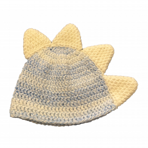 Handmade crocheted dinosaur hat for 6 - 12 months. Made to an original design by Lisa.