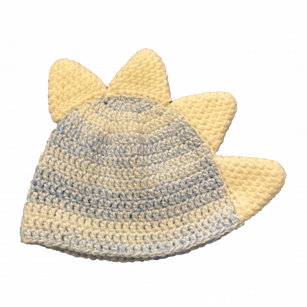 Handmade crocheted dinosaur hat for 6 - 12 months. Made to an original design by Lisa.