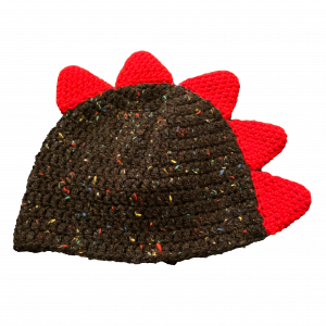 Handmade crocheted dinosaur hat for 6 - 12 months. Made to an original design by Lisa.
