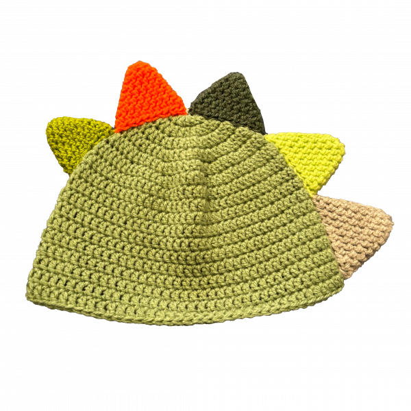 Handmade crocheted dinosaur hat for 3 - 10 year old. Made to an original design by Lisa.