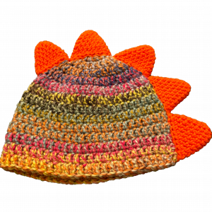 Handmade crocheted dinosaur hat for 1 - 3 year old. Made to an original design by Lisa.