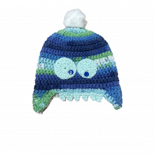 Handmade crocheted dinosaur hat for 6 - 12 months. Made to an original design by Lisa.