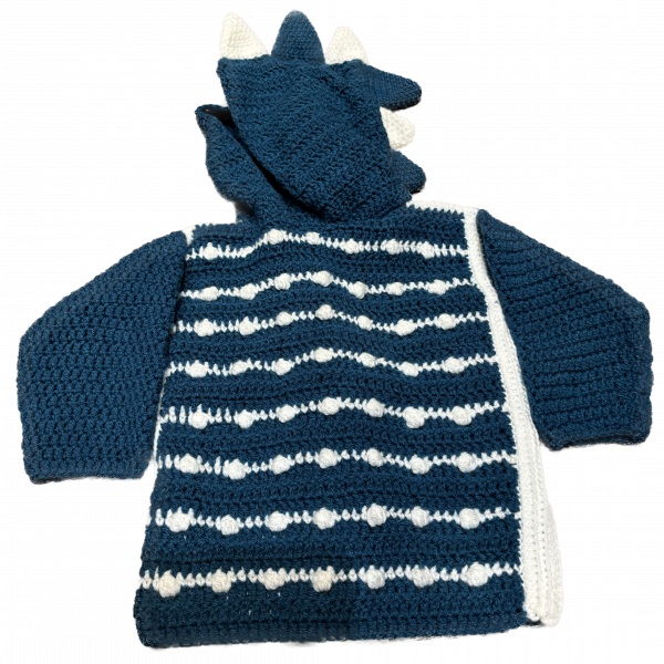 Handmade crocheted dinosaur hoodie for 6 - 12 months old. Made to an original design by Lisa.