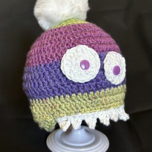 Handmade crocheted monster hat for 6 - 12 months. Made to an original design by Lisa.