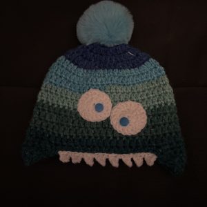 Handmade crocheted monster hat for 6 - 12 months. Made to an original design by Lisa.