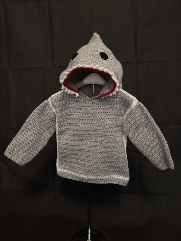 Handmade crocheted shark hoodie for 1 - 2 years old. Made to an original design by Lisa.